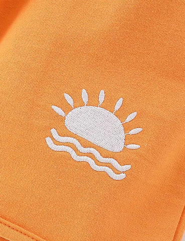 Set con cappuccio stampato sole