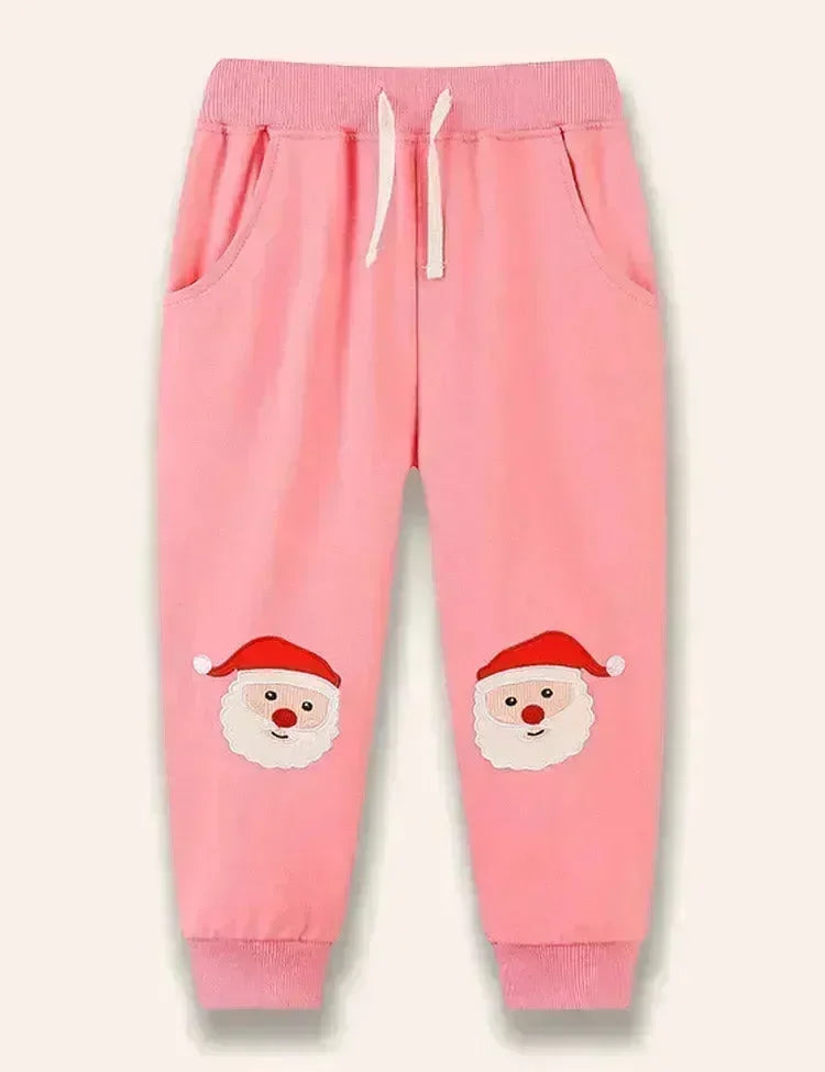 Weihnachtliche Hosen mit Weihnachtsmann-Applikation