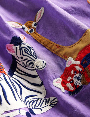 Kleid mit Zoo-Tier-Applikation