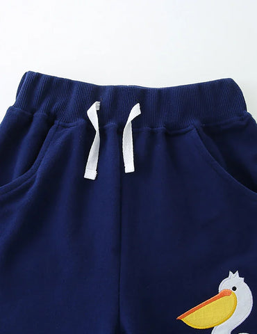 Short en coton brodé pélican de dessin animé