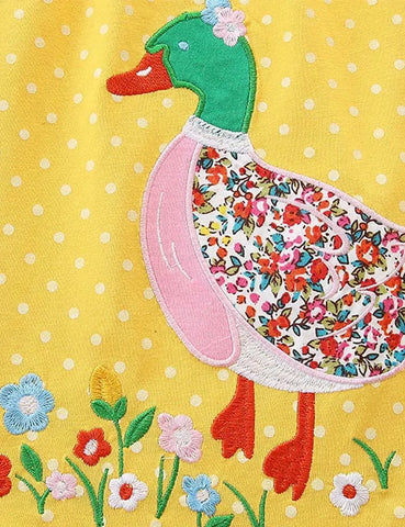 Gepunktetes Kleid mit Enten-Applikation im Floralmuster
