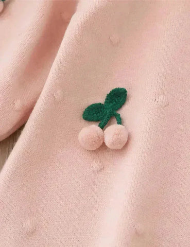 Weihnachtliches Strickkleid mit Kirschen